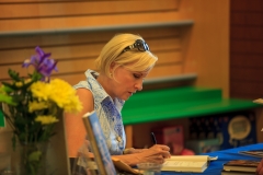 Mika Brzezinski, co-host of MSNBC’s Morning Joe, autographs her book at a signing event in Lancaster, PA.