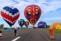 Avondale, PA, USA - June 24, 2018: Hot air balloons ready for flight at the Chester County Balloon Festival at the New Garden Flying Field in Toughkenamon PA.