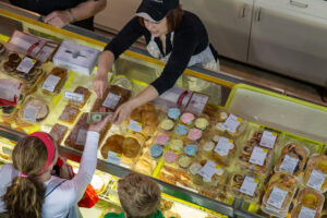 Buying pastry at a market.